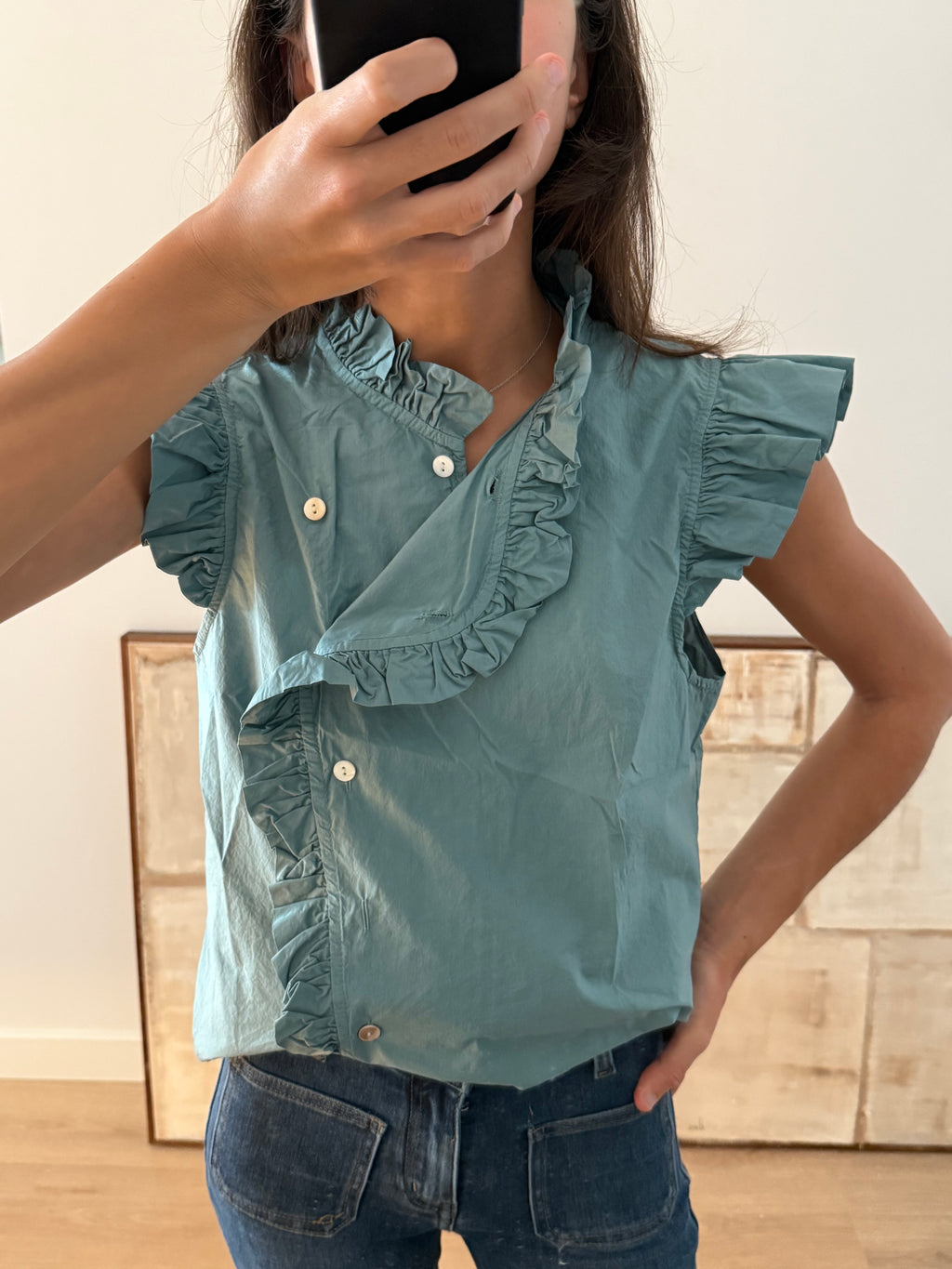 Blusa azul verdoso cruzada botones